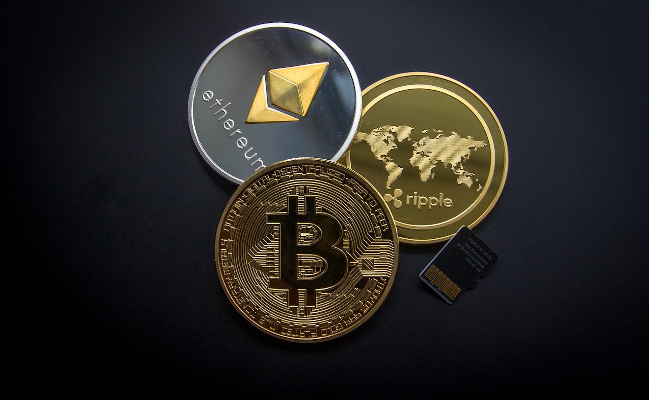 photo showing three cryptocurrencies