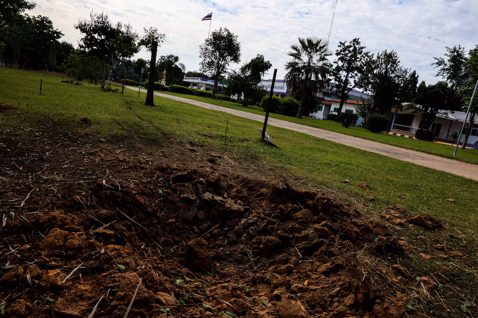 A view of a crater in the ground following an attack by Cambodia's artillery, after Thailand scrambled an F-16 fighter jet to bomb targets in Cambodia on Thursday after artillery volleys from both sides killed civilians, at the Phanom Dong Rak Hospital, in Surin, Thailand, July 25, 2025. REUTERS/Athit Perawongmetha